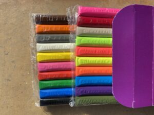 The Ultimate Guide | 10 Art Supplies Kids Love! clay in different colors