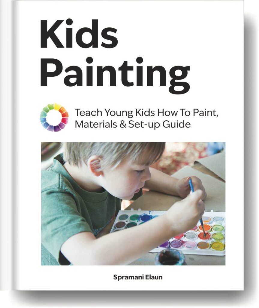 cover of kids painting, boy choosing colors in a water color palette with paintbrush